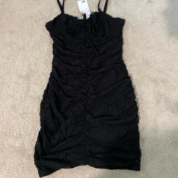 Black Tight Mini Dress - Picture 2 of 4